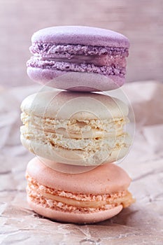 Nice macaroons on craft background