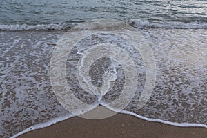 Nice movement of wave on the sea coast beach on sunset time