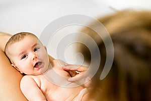 Nice newborn baby laughing