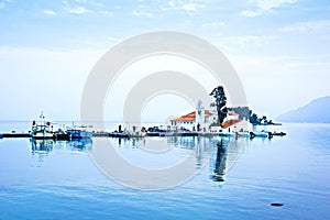 Nice optimistic view of Vlacherna Monastery on the Kanoni peninsula in Kerkyra, Corfu, Greece. popular tourist attractions.