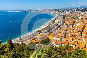 Nice panorama with Vieille Ville old town district, Promenade des Anglais boulevard and beach at French Riviera in France