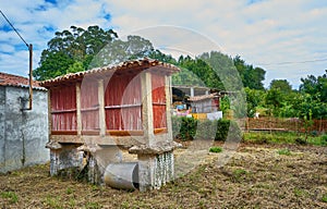 Nice photo with a hÃÂ³rreo, which is a construction designed to store and preserve food away from moisture and animals to keep it photo