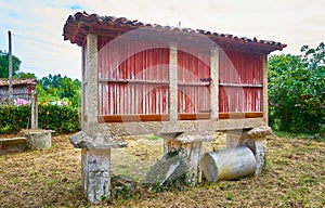 Nice photo with a hÃÂ³rreo, which is a construction designed to store and preserve food away from moisture and animals to keep it photo