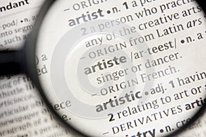 Artiste word or phrase in a dictionary photo