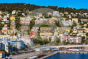 Nice Port and yacht marina district sunset panorama with Mont Boron hill at French Riviera of Mediterranean Sea Harbor in France