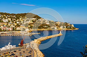 Nice Port and yacht marina district sunset panorama with Mont Boron hill at French Riviera of Mediterranean Sea Harbor in France