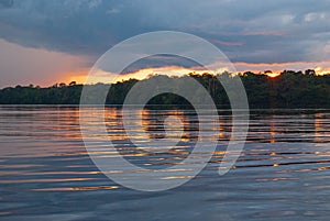 Nice postcard a sunset or sunrise in the Amazon river of South America