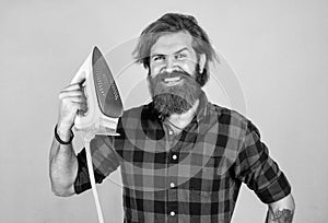 nice quality. home domestic duties. mature brutal hipster use modern technology. household concept. guy ironing