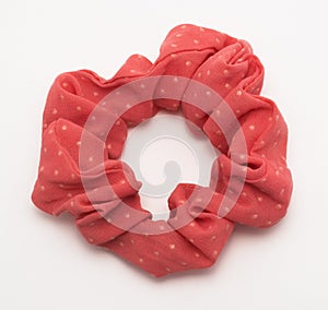 Nice red hair tie on white background