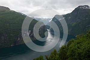 Nice scenic views of the high cliffs and deep waters of the beautiful UNESCO Geiranger Fjord