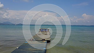 Nice sea and wooden pier with Blue sky,Thailand Sea