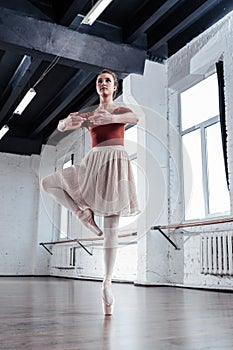 Nice serious ballerina preparing to do a pirouette