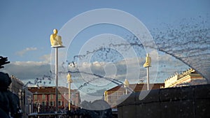Nice sky statue. Action. Statue from Conversation a Nice by Jaume Plensa made in 2007 on place Massena in Nice, France