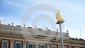 Nice sky statue. Action. Statue from Conversation a Nice by Jaume Plensa made in 2007 on place Massena in Nice, France