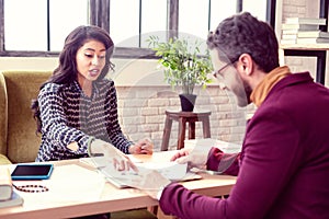 Nice smart woman working as an astrologist