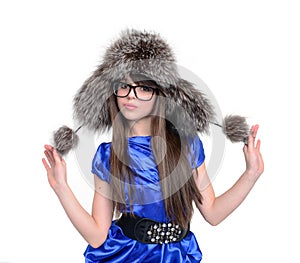 Nice teen in fur hat with pompons photo