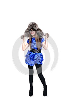 Nice teen in fur hat with pompons photo
