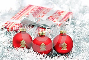 Nice three red christmas ball and present