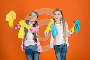 Nice and tidy. Girls with mist spray and rag ready for cleaning. Household duties. Little helper. Girls cute kids love