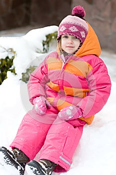 Nice toddler girl in winter pink hat