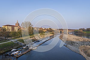 Nice view of covered bridge and Pavia Cathedral in left side at sunny day in Pavia