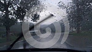 Nice view from front seat of a car while raining