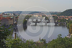 Nice view of the Vltava River and the bridges at sunny summer day, Prague, the Czech Republic