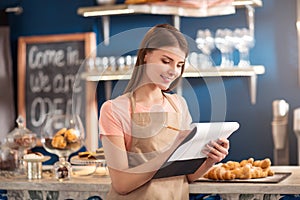 Nice waitress making notes