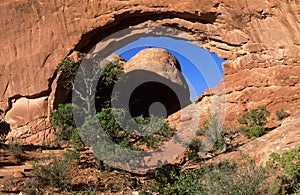 Nice window in a rock - Arches National Park, Utah, USA photo