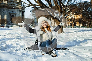 Nice winter girl having fun outdoor