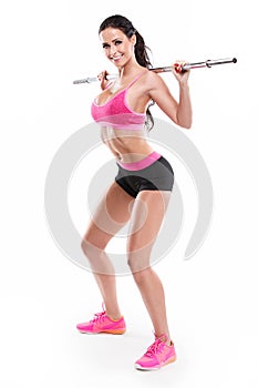 Nice woman doing squat workout with big dumbbell, retouched