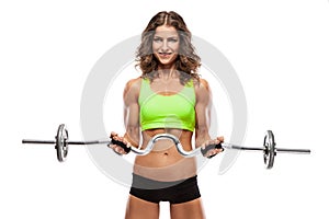 Nice woman doing workout with big dumbbell (retouched)