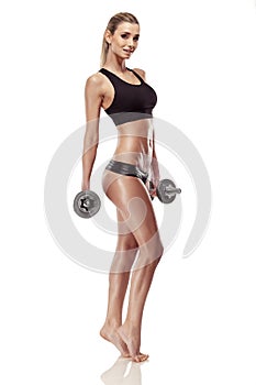 Nice woman doing workout with dumbbell