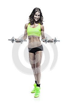 Nice woman doing workout with dumbbell (retouched)