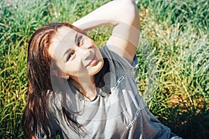 Nice woman in a field full of grass