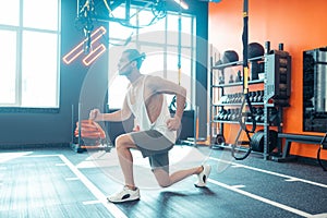 Nice young man doing a sports exercise