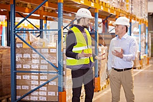 Nice young man talking to the logistics manager