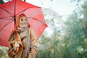 Nice young woman enjoy in rain. I like a rain