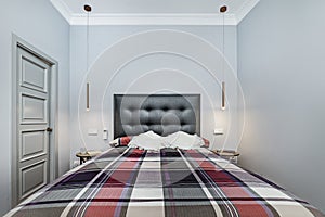 Nicely decorated double bedroom with bright fris fabric upholstered