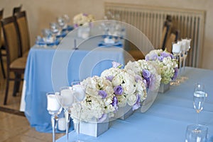 Nicely decorated wedding table with flowers