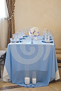 Nicely decorated wedding table with flowers