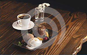 Nicely served chocolate fondant with ice cream. Food styling