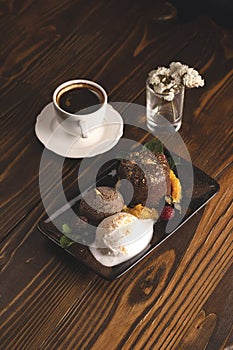 Nicely served chocolate fondant with ice cream. Food styling