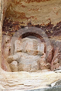 Niche with an image of the four armed Ganesha & a devotee carrying a banana plant, Udayagiri Caves, India