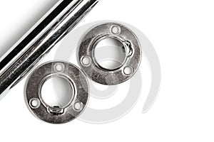 Nickel plated tube and two flanges for its attachment, white background.