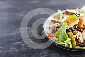 Nicoise salad with tuna, green beans, basil and fresh vegetables