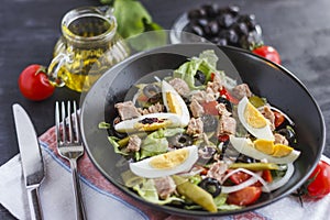 Nicoise salad with tuna, green beans, basil and fresh vegetables