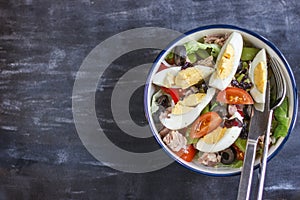 Nicoise salad with tuna, green beans, basil and fresh vegetables