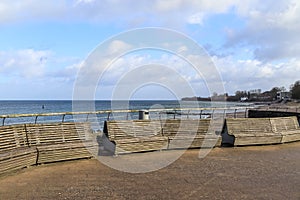 Niendorf, Germany - 30.January 2022: View of the stormy Baltic Sea at a pier in Niendorf on Timmendorfer Strand photo