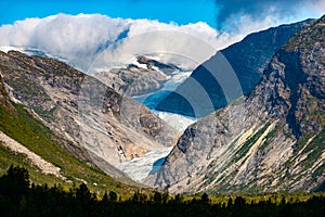 Nigardsbreen glacier arm of Jostedalsbreen glacier, Jostedalen valley as seen from the Jostedal visitor center photo